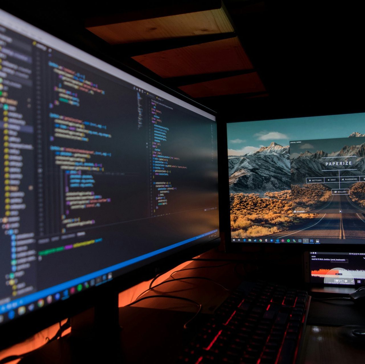 two black flat screen computer monitors